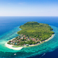 Wall Mural - Turquoise water and coral reefs around the island. Summer holiday vacation concept.