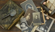  Still-life With Old Photo Album And Historical Photos Of Family