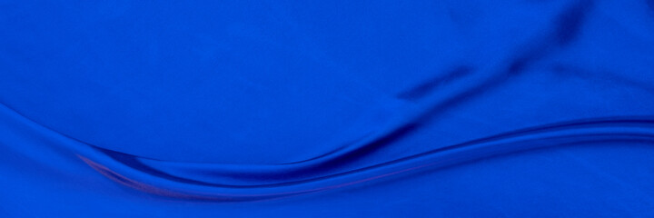 white blue satin texture that is white silver fabric silk background with beautiful soft blur patter
