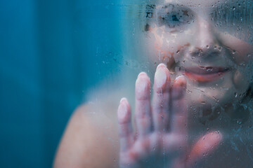 Wall Mural - Senior woman taking shower at home