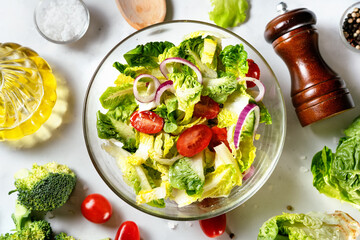 Wall Mural - Close up of healthy vegan green salad full of vitamins