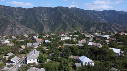 Wall Mural - Aerial Top View of small Village, surrounded by Mountains. Armenia, Gyumri