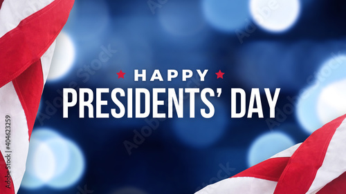 Obraz Dibond Happy Presidents' Day Text Over Blue Bokeh Lights Texture Background and American Flags