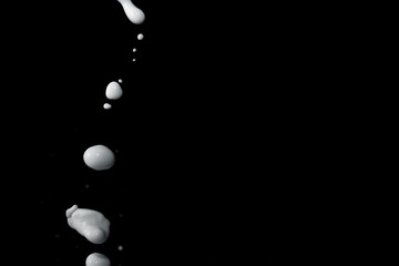 Canvas Print - milk splash on black background