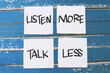 © airdone - Listen more talk less, text words typography written on paper against wooden background, life and business motivational inspirational