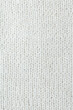 © Elena - Natural knitted fabric, hand knit, plain knitting,  white sheeps' wool, closeup, vertical photo