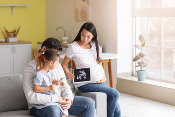 Poster - Pregnant Asian woman with her family at home