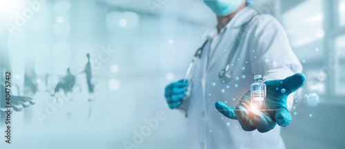 Obraz Dibond Doctor hold covid-19 coronavirus vaccine in laboratory. Research and development team successful develop vaccine and medicine for covid-19 pandemic. Global healthcare and medical technology concept.