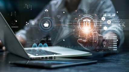 Leinwandbilder - Businessman using laptop and touching icon banking on network connection. Digital marketing. Finance and banking networking. Online shopping and customer network, cyber security. Business technology.