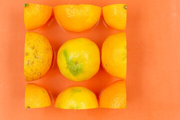 Oranges fruit on colored paper background