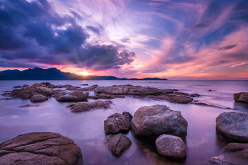 Wall Mural - Dramatic sunset over Calvi bay in Corsica