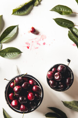 Wall Mural - Cherry. Cherries in white bowl. Red cherry. Fresh cherries. Cherry on white background. Cherries isolated on white. Healthy cherry fruits.