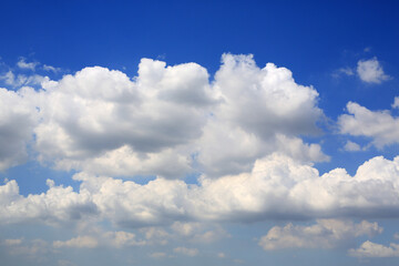 White fluffy cloud on blue sky background