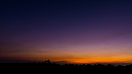 Wall Mural - beautiful twilight winter season sky with cloud and colorful sunset nature abstract background