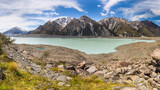 Fototapeta Zachód słońca - Tasman Lake with mountains in the background, New Zealand