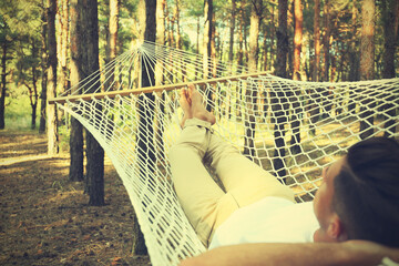 Sticker - Man resting in hammock outdoors on summer day