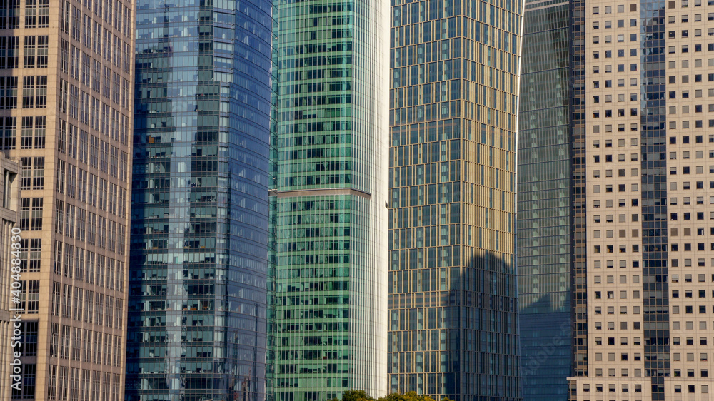 A row of colorful skyscrapers in Shanghai Pudong district - obrazy, fototapety, plakaty 