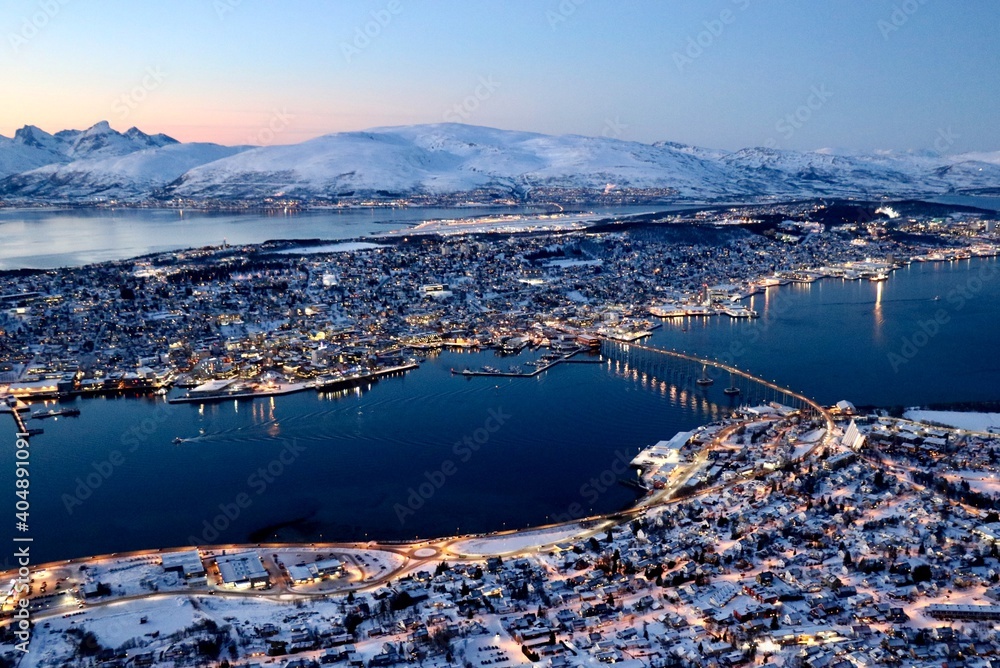 Aerial View Of City By Snowcapped Mountains Against Sky - obrazy, fototapety, plakaty 