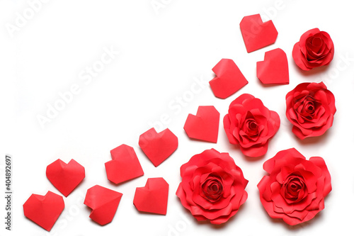 Few handmade red paper roses and 3D hearts on white background. Love, Valentine's, mother's, women's day, relations, romantic, wedding template 