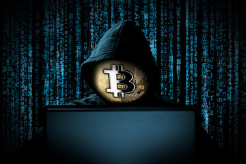 hacker with bitcoin face mask behind notebook laptop front of blue source binary code background internet cyber hack attack crypto currency blockchain computer concept