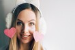 Close up portrait of a young fashion beautiful blonde woman. Girl hipster with pink hearts. Valentines day. Love.Space for text.t