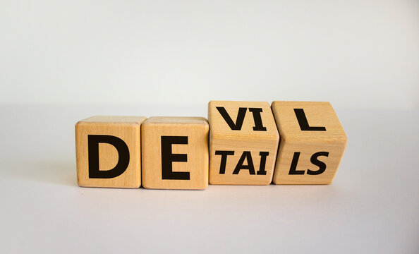 devil in the details symbol. turned cubes and changed the word 'details' to 'devil'. beautiful white