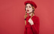 © SHOTPRIME STUDIO - pretty woman in red dress caps pigtails red background