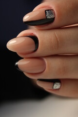 Wall Mural - fashion manicure of nails on a beautiful background