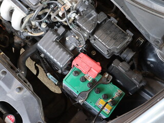 It is part of a car engine compartment that consists of various equipment. Including battery