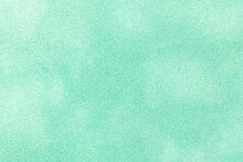 Light Green Matte Background Of Suede Fabric, Closeup. Velvet Texture Of Textile
