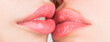 © Yevhen - Two beautiful sexy lesbians in love. Lip care and beauty. Closeup of beautiful young woman healthy lips. Lesbian couple kiss lips. Passion and sensual touch. Closeup of women mouths kissing