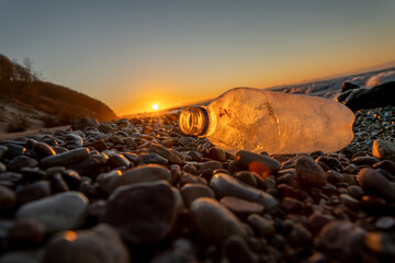 PET plastic bottle stranded on the sea beach