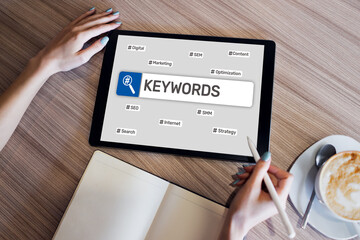 Wall Mural - Keywords. SEO, Search engine optimization and internet marketing concept on screen.