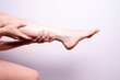 © Аркадий Коробка - massage of leg muscles with hands, leg pain