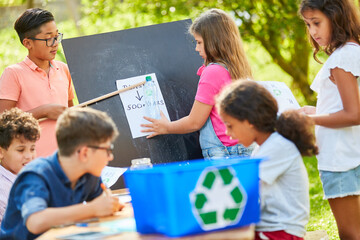 Children learn recycling in an ecology project