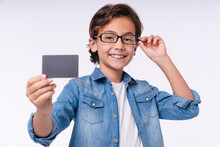Clever 10s White Boy With Credit Card Isolated Over White Background