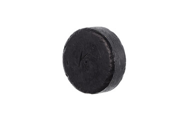 Wall Mural - old hockey puck isolated on white background