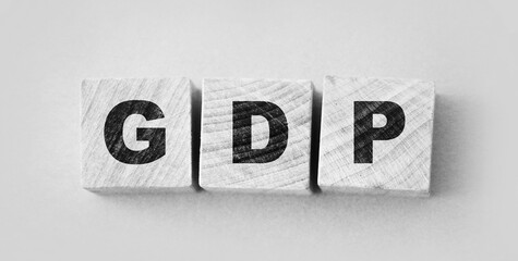 GDP Gross Domestic Product word made with wooden blocks concept