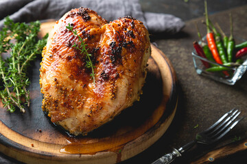 Wall Mural - Baked chicken breast with aromatic herbs