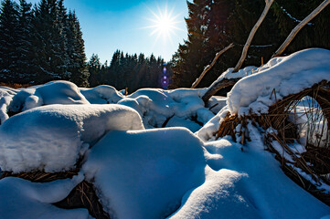 Wall Mural - frozen river, covered with snow and sunset