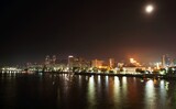 Fototapeta  - Big Dnieper river in the huge night bright city of Dnipropetrovsk in Ukraine