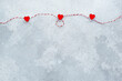 Valentines day, wedding invitation background, red hearts  hanging on a rope . top view, flatly, copy space.