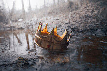 Crown In The Muddy Water