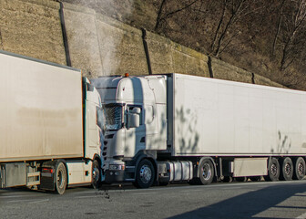 Frontal collision between two goods trucks. Truck accident