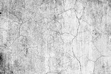 Fototapeta Desenie - Texture of a concrete wall with cracks and scratches which can be used as a background