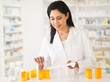 © Tetra Images/Tetra Images - Pharmacist preparing medicines