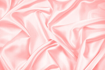 Wall Mural - Pink silk satin background. Soft wavy folds on the fabric. Wedding, anniversary, valentine, love, tender, holiday, celebration, card. Beautiful pink abstract background with copy space for your design