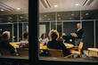 © Jacob Lund - Colleagues at an office meeting