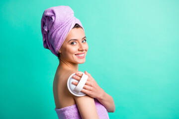 Sticker - Profile photo of tender relaxed girl hold massage brush toothy smile wear violet towel turban isolated teal color background