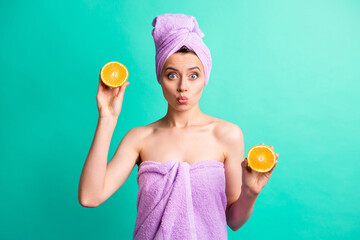 Sticker - Photo of attractive lady hold orange slices healthy eating send air kisses wear violet towels isolated teal color background